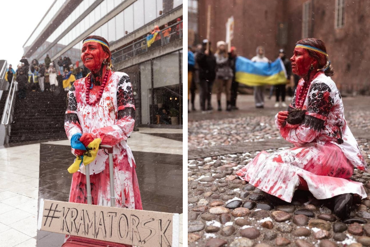 На кадрах українка в крові, яка плаче та колихає вбите дитя.