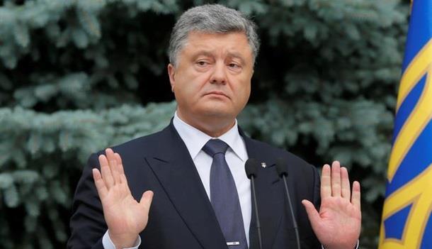 Оголошений у розшук, підозрюваний в розтраті депутат Олександр Онищенко стверджує, що президент Петро Порошенко намагався купити телеканал 