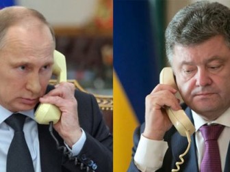 Стало известно, о чем говорили Порошенко и Путин