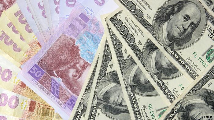 Официальный курс доллара снизился до 21,01 гривен.