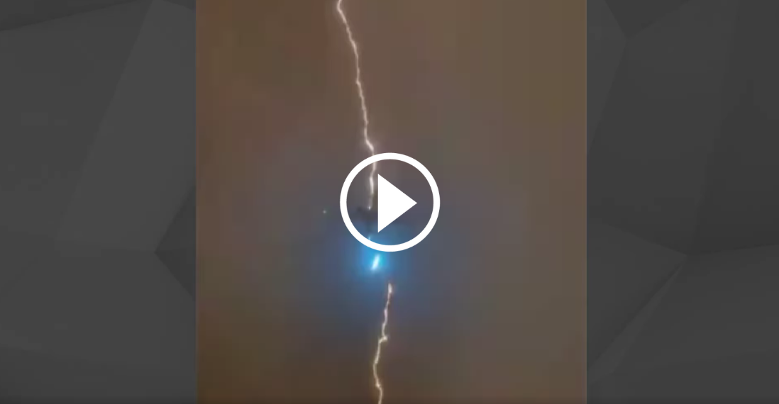 The video shows a lightning strike on a passenger plane.